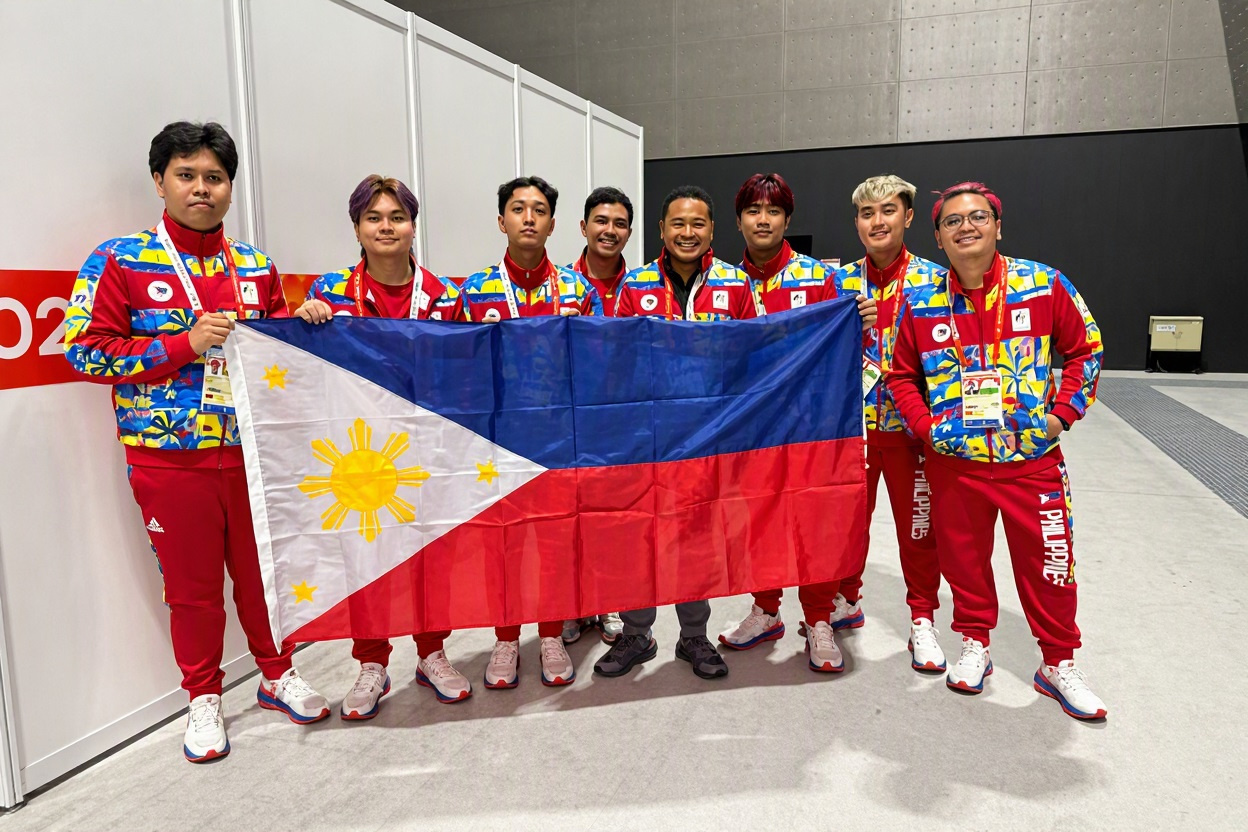 SIBOL Pokémon UNITE team members hold the Philippine flag after winning bronze at the 2026 Asian Games.