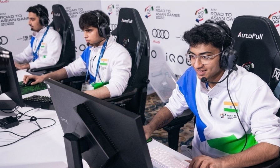 Indian esports players competing at computers during a major Asian esports event.